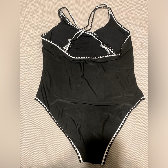 NWT. SHEIN one piece swimsuit. Black with white trim. Criss-cross back straps. - Picture 2 of 5